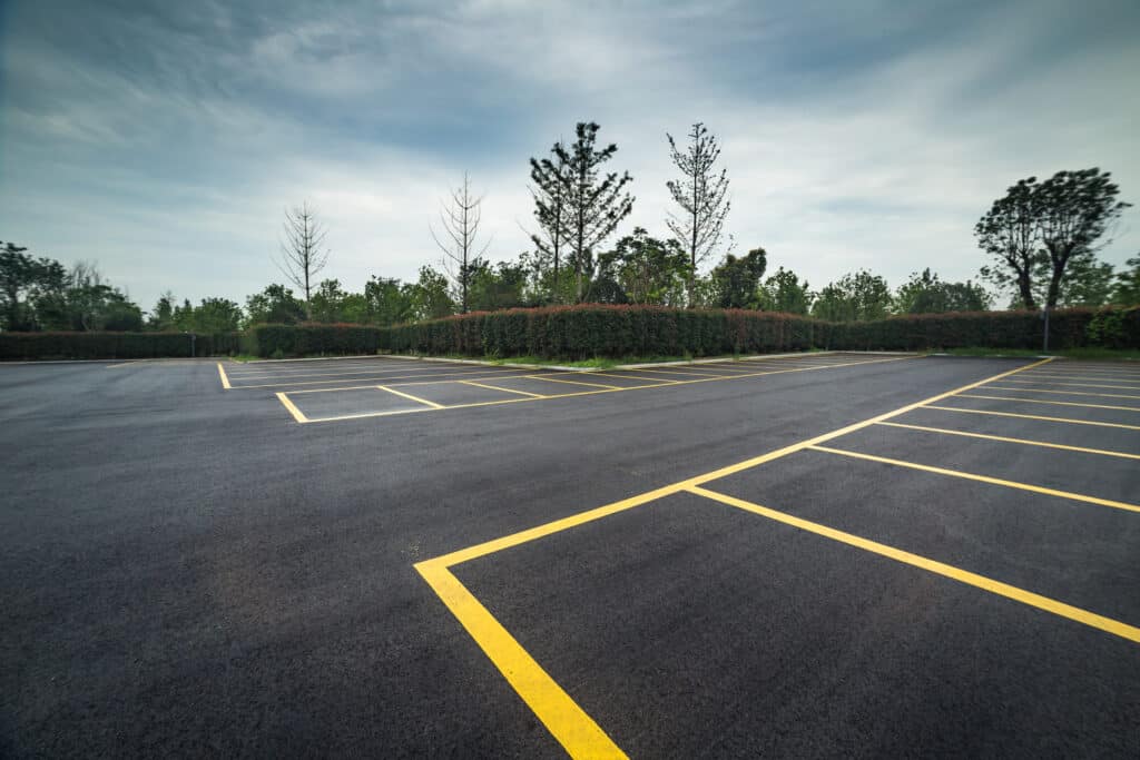 The Importance of Proper Parking Lot Drainage | Commercial Concrete ...